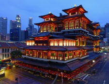 A captivating image of a beautifully lit Buddhist temple in Sri Lanka, glowing brightly in the heart of the city.